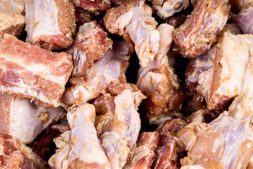 Sauce marinated Pork rib chop into pieces. Fried Pork Bone with Garlic .