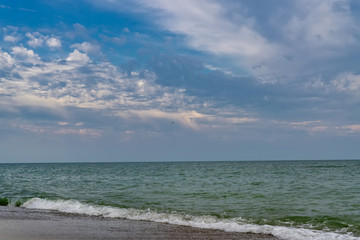 Relaxing seascape with wide horizon of the sky and the sea