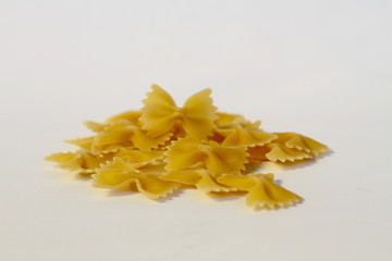 farfalle pasta on white background