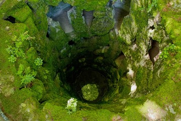 green stone well in the park