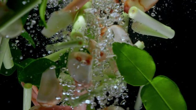 tom yum ingredient drop water slower motion