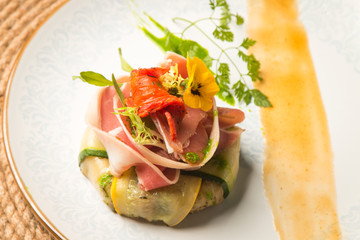 
Unusual beautiful serving food on a plate closeup. Plate, diet, delicious food, healthy food, lunch in a restaurant, greens