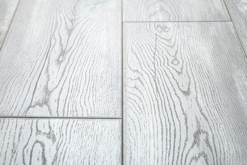 Laminate background. Wooden laminate and parquet boards for the floor in interior design. Texture and pattern of natural wood