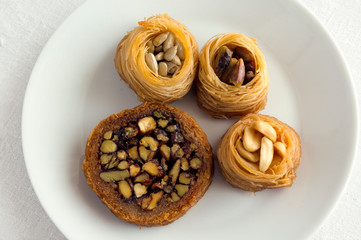 kataifi roll and nests stuffed with nuts and seeds