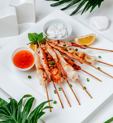 chicken kebab on stick on the table