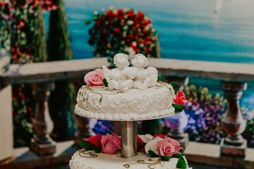wedding cake with figures of angels