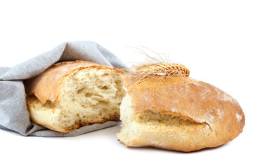 Loaf of rye bread on white background