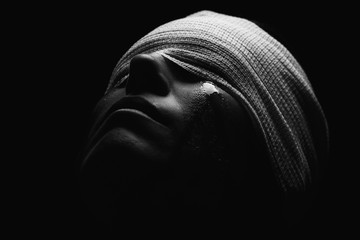Conceptual photo of a hurt woman crying with bandage around her head artistic concersion - 337263350