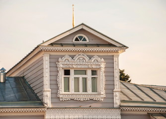 Attic of  wooden house is decorated with exquisite wood carvings.