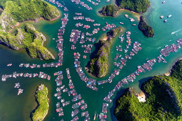 Floating fishing village and rock island in 