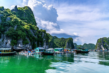 Fototapeta premium Floating fishing village and rock island in 