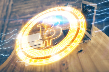 Double exposure of blockchain and crypto economy theme hologram and table with computer background. Concept of bitcoin cryptocurrency.