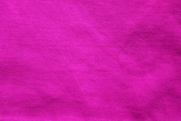 Purple cotton cloth texture background, empty seamless colorful cloth wrinkled pattern. Simple blank backdrop of violet colour material to use as template, banner or wallpaper, close up top view
