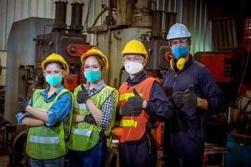Portrait woman worker and engineer  under inspection and checking production process on factory...