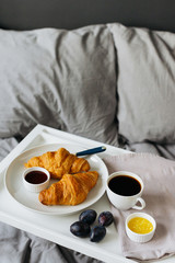 breakfast with croissant and coffee