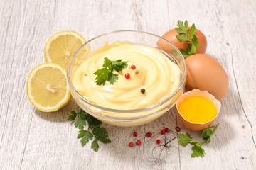 bowl of homemade mayonnaise and ingredient