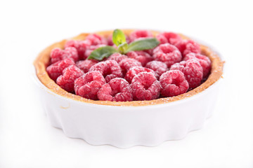 raspberry tart with cream isolated on white background