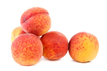 Fresh peach fruit isolated on a white background