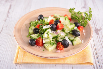 vegetable salad with cucumber, tomato and olive