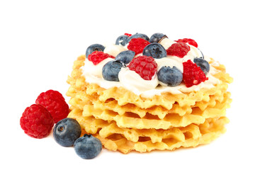 Fresh blueberries, raspberries and waffle cookies