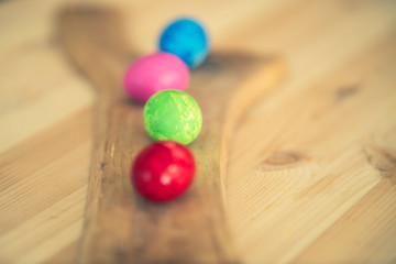 Easter eggs on wooden background