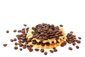 Waffle cookies and coffee grains on a white background