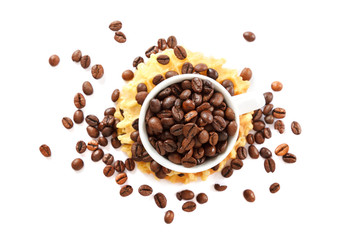 Waffle cookies and coffee grains on a white background