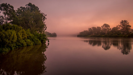 Obraz na płótnie Canvas Misty River Sunrise Panorama