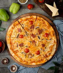 crispy pizza with sausage and mushrooms