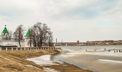 Fototapeta premium Ice fishing on ice of Volga river