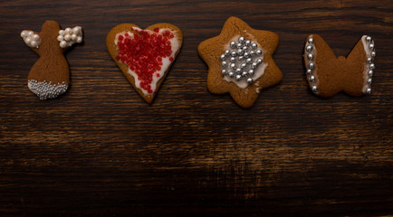 homemade gingerbread of various shapes with white icing