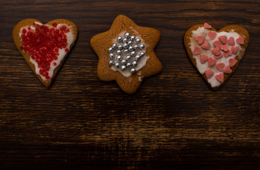 Fototapeta na wymiar homemade gingerbread of various shapes with white icing