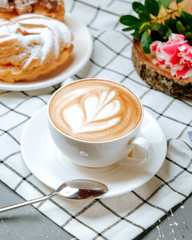 fresh cappuccino on the table _