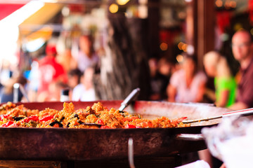 Closeup of Seafood Paella in a large frying pan at Chatuchak weekend market in Bangkok - Thailand