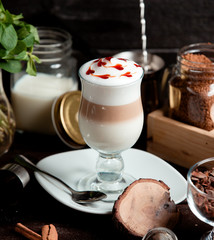 fresh latte with strawberry sauce