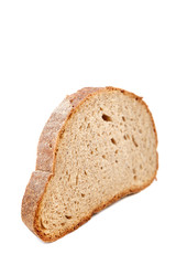 Rye and wheat bread loaf on white background.