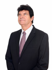 Portrait of mature handsome businessman in suit thinking
