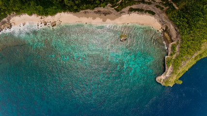 Top view on hardly accessible deserted beach.