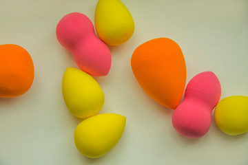 bright beauty blenders on a white background