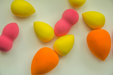 bright beauty blenders on a white background