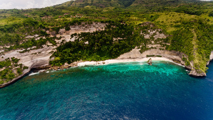 Aerial view on hardly accessible deserted beach.