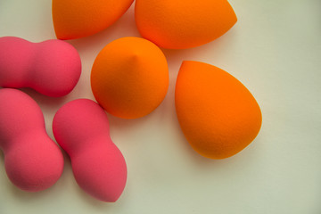 bright beauty blenders on a white background