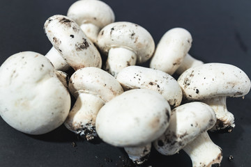 mushrooms on black table