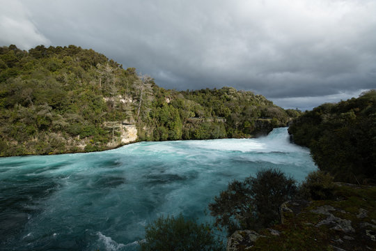 Huka Falls on Waikato River, New Zealand. In cloudy day.