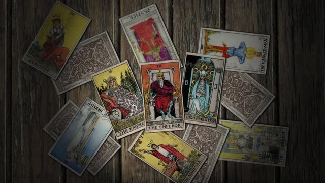 Deck of Tarot Cards on the Floor in Chaos With Three Main Cards of High Arcane The Emperor Empress and Priestess Meaning the Father and Daughter Relationship