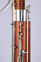 Wooden bassoon isolated on a white background. Music instruments.