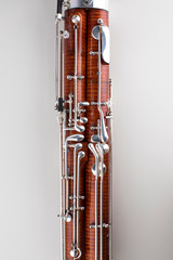 Wooden bassoon isolated on a white background. Music instruments.