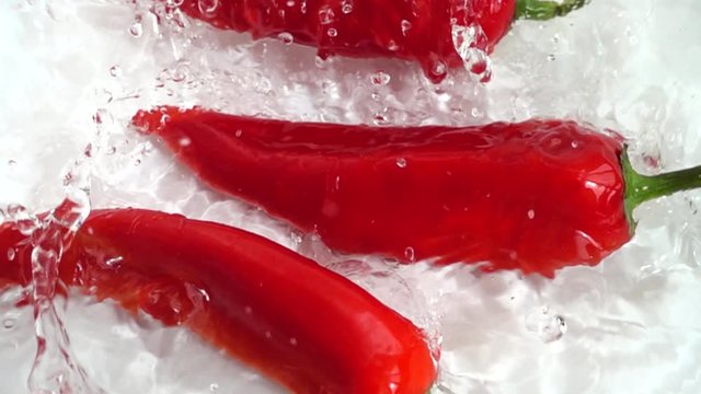 Juicy red Capi pepper. Slow motion.
