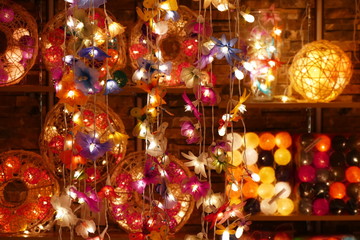 dream catcher decoration with beautiful lights and colors around, taken in a traditional shop in...