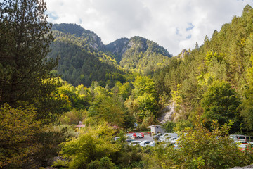 Fototapeta premium Mountains summer landscape over dead end with car parking. Macedonia. Greece.